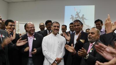 Col Murad with fellow toastmasters. Jeffrey E Biteng / The National