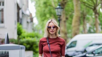 Slides, given a bit of a lift with a platform, can be easily worn with jeans, culottes, skirts, tapered trousers or shorts. Christian Vierig / Getty Images