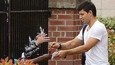 ergio Aguero signed autographs outside a Manchester hospital, after his medical.