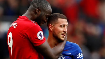 Eden Hazard, right, with Manchester United striker Romelu Lukaku after Sunday's Premier League match at Old Trafford. Reuters