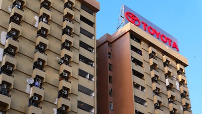 The well-known sign on the Toyota building was remounted in May.