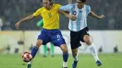 Brazil's Lucas and Argentina's Juan Riquelme during last year's Olympics. Even though the football season stops during the summer there are plenty of games played.