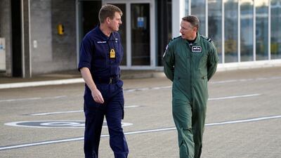 Vice-Admiral Ben Key, who supervised the UK's withdrawal, and Air Mobility Force Commander to Air Commodore David Manning prepare to address the media as members of the British armed forces arrive at RAF Brize Norton. Reuters