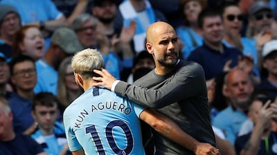 Manchester City's Sergio Aguero is substituted as Manchester City manager Pep Guardiola looks on. Reuters