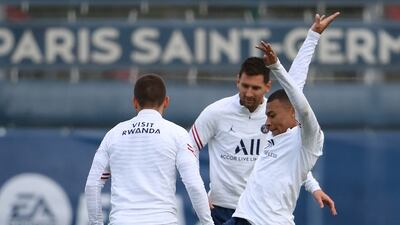Kylian Mbappe and Lionel Messi. AFP