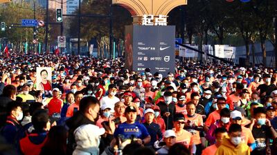 Runners take part in the 2020 Shanghai marathon. AFP