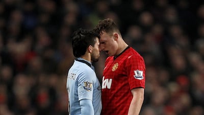 Manchester City's Sergio Aguero and Phil Jones of Manchester United square-up during the Premier League derby at Old Trafford in April, 2013. PA