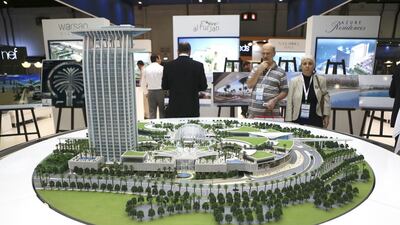 7. Nakheel Mall Nakheel Mall, a Dh2.5 billion, 418,000 square metre project on the Jumeirah Palm, is set to be completed in 2016. It will house a five-star hotel, a multiplex cinema, and a 180-metre high observation tower. It will have five storeys of retail outlets targeting affluent consumers, and Nakheel hopes that the mall will “compete with the world’s most iconic fashion destinations”. A Dh1.2 billion contract to build the project was jointly awarded to United Engineering Construction and Acto General Contracting Company in May. Dar Al Handasah, which won the contract to design Egypt’s new Suez canal project, has been hired as an engineering consultant for the mall. Nakheel says agreements to lease out more than half of the project’s retail space are already in place. The company is also building a 50-storey mixed-use tower block adjacent to the mall, and a 130-apartment residential building, which will connect to the mall by a walkway. Sarah Dea / The National