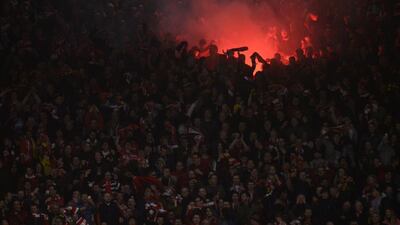 Liverpool fans celebrate after defender Dejan Lovren scored the winning goal. Oli Scarff / AFP