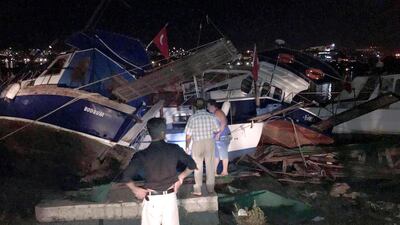 Boats that crashed on top of each other in the harbor in Bodrum, Turkey, early Friday, July 21, 2017. A powerful earthquake struck Turkey's Aegean coast and nearby Greek islands, sending frightened residents running out of buildings they feared would collapse and into the streets. (DHA-Depo Photos via AP)