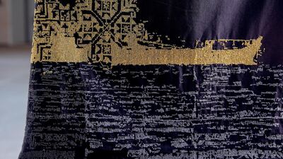 Detail from the 'Yaffa (Jaffa)' thobe of intricate tatreez work. Victor Besa/The National