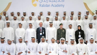 ABU DHABI, UNITED ARAB EMIRATES - September 20, 2017: (2nd row L-R) HH Major General Sheikh Khaled bin Mohamed bin Zayed Al Nahyan, Deputy National Security Adviser, HH Sheikh Mansour bin Zayed Al Nahyan, UAE Deputy Prime Minister and Minister of Presidential Affairs, HH Lt General Sheikh Saif bin Zayed Al Nahyan, UAE Deputy Prime Minister and Minister of Interior, James Morse, President of the Rabdan Academy, HH Sheikh Mohamed bin Zayed Al Nahyan, Crown Prince of Abu Dhabi and Deputy Supreme Commander of the UAE Armed Forces and Major General Mike Hindmarsh, Chairman of the Board of Trustees of the Rabdan Academy, stand for a photograph during the inauguration of the Rabdan Academy. ( Mohamed Al Hammadi / Crown Prince Court - Abu Dhabi ) ---