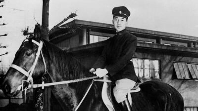 This file photo taken in the 50s shows Prince Akihito posing on horseback at an unknown location. Japan's outgoing Emperor Akihito and Empress Michiko dramatically modernised the tradition-bound monarchy, bringing themselves closer to the public and boosting popular support for the household. AFP