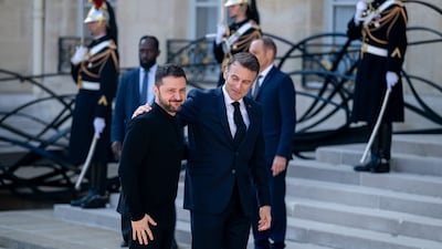 French President Emmanuel Macron, right, welcomes Ukrainian President Volodymyr Zelenskyy to the summit at the Elysee Palace in Paris. Bloomberg