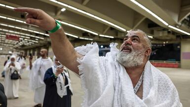 A pilgrim performs the symbolic stoning of the devil ritual as part of the Hajj pilgrimage in Mina. AFP