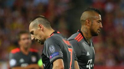 Bayern Munich’s Franck Ribery and Arturo Vidal react during the match against Atletico Madrid. Paul Hanna / Reuters