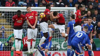 Leicester City's James Maddison, right, shoots on goal from a free-kick. EPA
