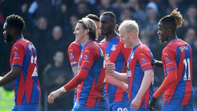 Will Hughes celebrates with teammates. Getty