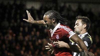 Calvin Zola, left, is one of the reasons Aberdeen have climbed to second in the Scottish Premier League this season. Danny Lawson / PA Wire