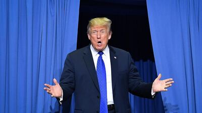 US President Donald Trump arrives at a "Make America Great Again" rally at Landers Center in Southaven, Mississippi. AFP
