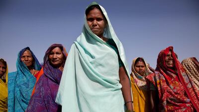 'Pillars'. "Slaveholders burned down the homes of these villagers when they declared their freedom," says Kristine. "Many villagers wanted to give up. The women in front rallied their frightened neighbors and led them to freedom. Grassroots activists helped the village get a quarry lease of their own. The women say, 'This is our quarry, we are the owners, we will never go back to slavery again.' They do the same backbreaking work, but they get paid and they do it for themselves, in freedom. It makes all the difference in the world."