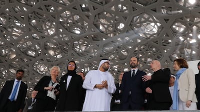 Noura Al Kaabi, Minister of Culture and Knowledge Development, Mohammed Al Mubarak, Chairman of Department of Culture and Tourism, Jean-Luc Martinez, President of Musee du Louvre, architect Jean Nouvel and French Prime Minister Edouard Philippe tour Louvre Abu Dhabi. Karim Sahib / AFP