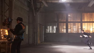 As these exclusive behind-the-scenes images from the shooting of Stewart’s film suggest, things here take on a darker, frenetic pace. Stewart enters and appears to be searching for something. Courtesy Chanel