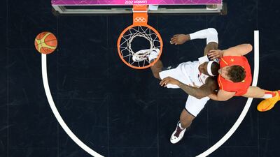 Spanish centre Marc Gasol challenges US forward LeBron James during the London 2012 Olympic Games men's gold medal basketball final. Mark Ralston/AFP Photo