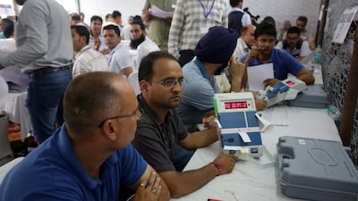 Election officials count votes in Jammu, the winter capital of the Indian-controlled section of Kashmir. EPA