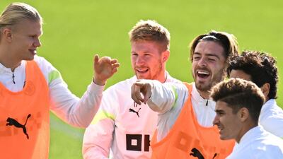 From left - Manchester City's Erling Haaland, Kevin De Bruyne and Jack Grealish during training on the eve of their Champions League match against FC Copenhagen. AFP