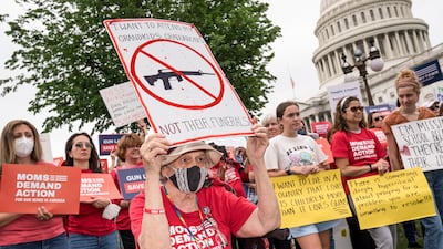 Activists join Senate Democrats outside the Capitol to demand action on US gun control legislation. AP