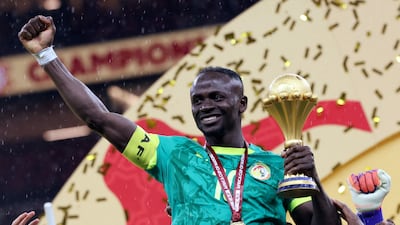 Soccer Football - CAF Africa Cup of Nations - Morocco 2025 - Final - Senegal v Morocco - Prince Moulay Abdellah Stadium, Rabat, Morocco - January 18, 2026 Senegal's Sadio Mane celebrates with the trophy after winning the Africa Cup of Nations REUTERS / Amr Abdallah Dalsh TPX IMAGES OF THE DAY