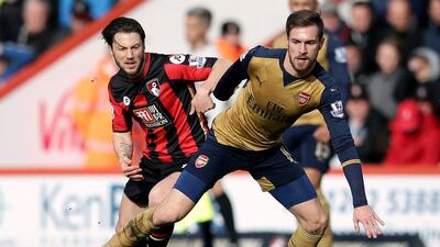Aaron Ramsey, right, was a part of the Arsenal side that returned to winning ways against Bournemouth on Sunday. (ohn Walton / PA