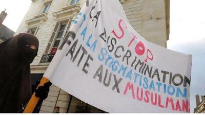 A woman wearing a niqab participates in a protest in France last February.