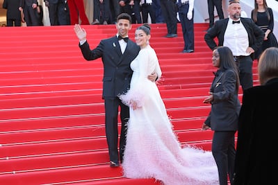 Hisham Gamal and Laila Ahmed Zaher attend the opening ceremony of the 2026 Cannes Film Festival. Getty