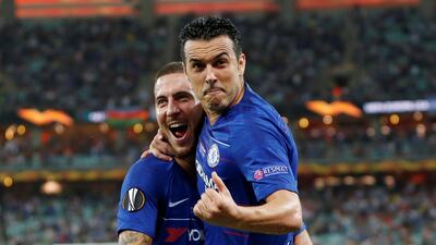 Chelsea's Pedro celebrates scoring their second goal with Eden Hazard. REUTERS