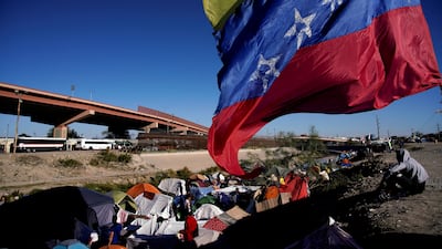 Venezuelan migrants who have been expelled from the US or are waiting for a change in immigration policy camp on the banks of the Rio Grande in Ciudad Juarez, Mexico. Reuters
