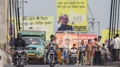 Election posters for Indian prime minister Narendra Modi’s Bharatiya Janata Party line the route of a bridge in Patna, Bihar, East India, in July, where his US$100 million Nai Manzil education and skills programme was launched. Prashanth Vishwanathan / Bloomberg