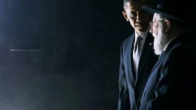 US President Barack Obama walks with Rabbi Israel Meir Lau during a visit to the Yad Vashem Holocaust Memorial last week, where he made an appeal for Israelis and Palestinians to resume peace talks. Jason Reed / Reuters