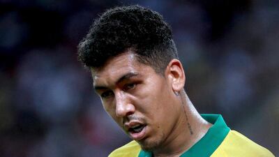 Liverpool striker Roberto Firmino has been called up to Brazil's 23-man squad for next month's friendlies against Argentina and South Korea. EPA