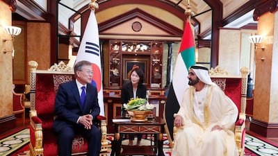 South Korean President Moon Jae-in speaks with Mohammed bin Rashid, Vice President and Ruler of Dubai, during a meeting at Zabeel Palace in Dubai on Tuesday. EPA / Yonhap
