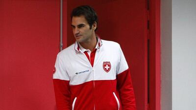 Switzerland's Roger Federer arrives for the Swiss team press conference on Tuesday in Lille ahead of the Davis Cup final, beginning Friday. Michael Spingler / AP / November 18, 2014