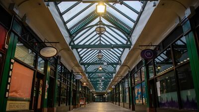 An empty arcade of closed shops in London. Getty Images