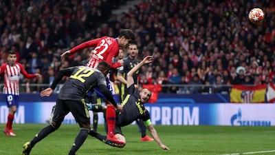 Alvaro Morata scores with a header before the goal is disallowed. Reuters