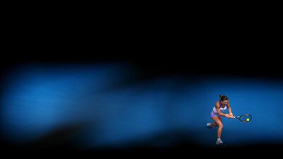 Simona Halep returns a shot to Ekaterina Makarova during her 4-6, 0-6 Australian Open quarter-final loss on Tuesday. Scott Barbour / Getty Images