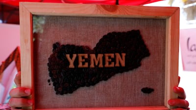 A map of Yemen made from roasted Arabica coffee beans on display at an outdoor market in Sanaa. EPA