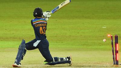 India's cricket captain Shikhar Dhawa is dismissed by Sri Lanka's Akila Dananjaya.