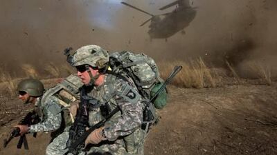 US soldiers prepare for the landing of a CH-47 Chinook helicopter in Afghanistan in this 2009 photo. The helicopter is similar to the one that was shot down on Friday killing 38 US and Afghan troops in Wardak province south-west of Kabul.