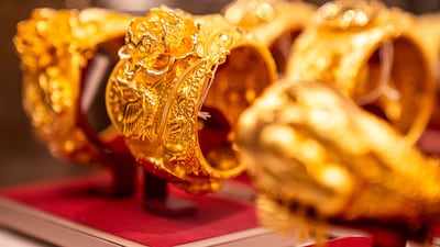 Gold bangles on display at a store in Hong Kong. Bullion has recorded a year-to-date gain of more than 25 per cent. Bloomberg