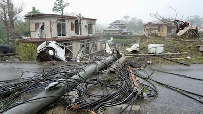 Destroyed houses, cars and power poles, which according to local media were believed to be caused by a tornado, are seen as Typhoon Hagibis approaches the Tokyo area in Ichihara, east of Tokyo, Japan. Reuters